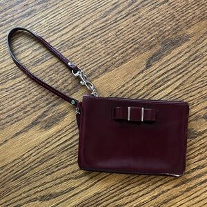 Coach Burgundy Wristlet with Bow Accent